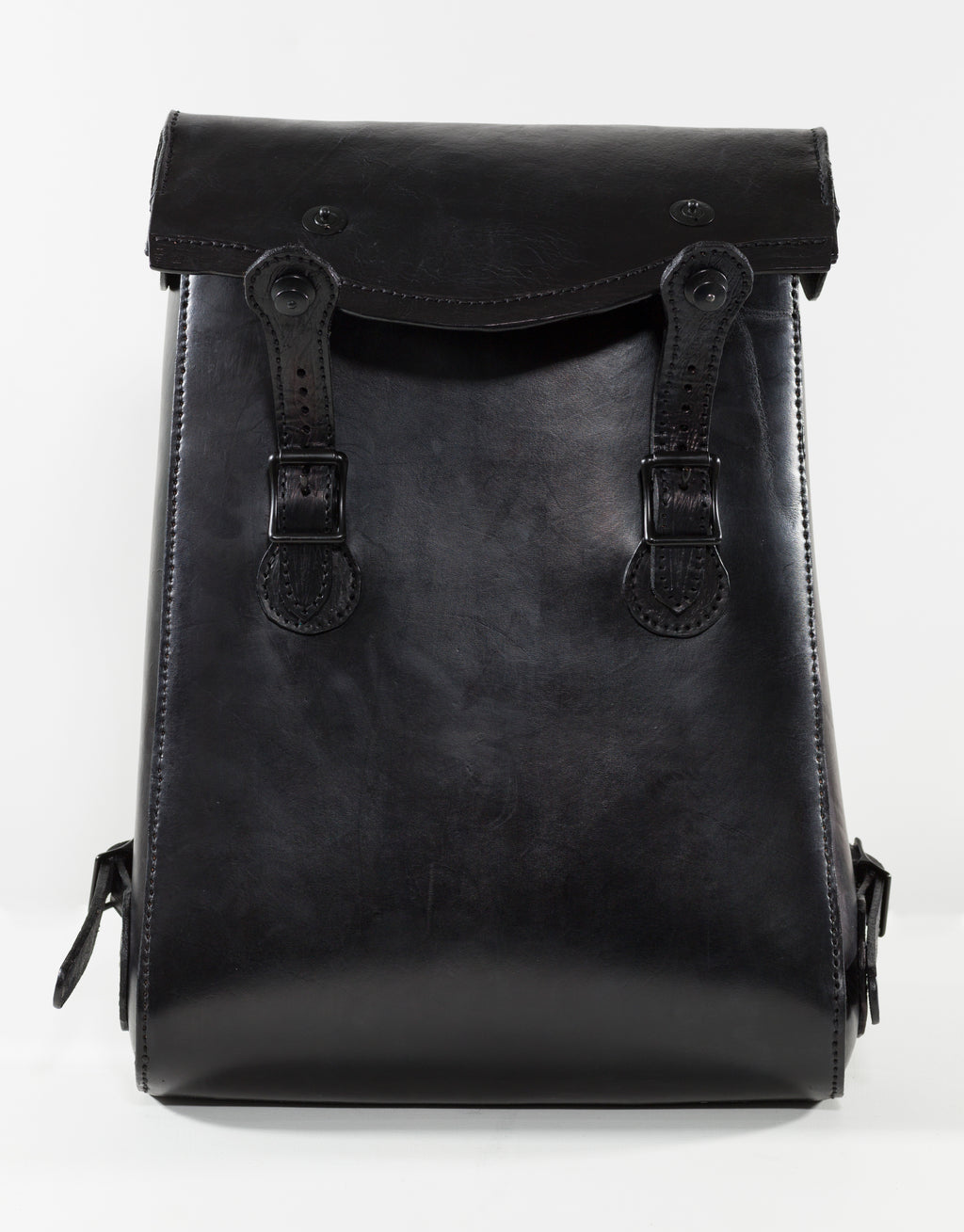 “VELA Noir backpack open to show the purple lining and interior pocket.”