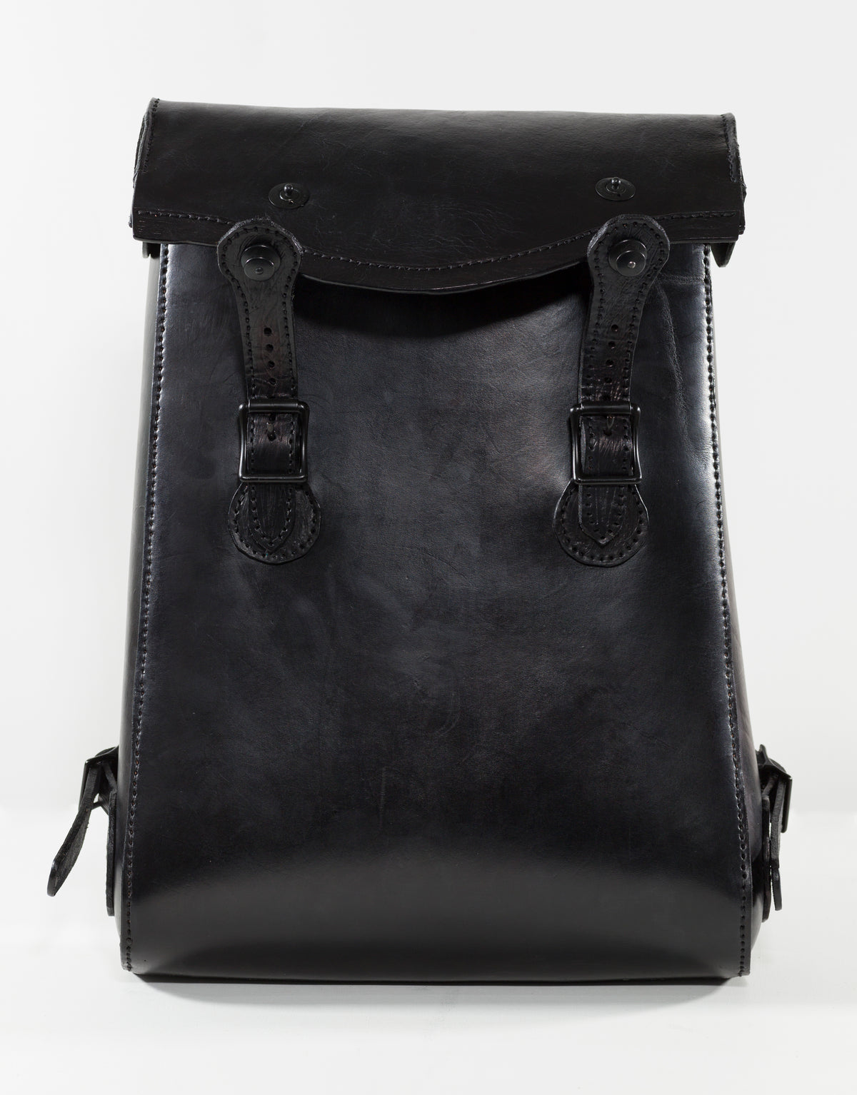 “VELA Noir backpack open to show the purple lining and interior pocket.”