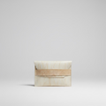 “Élan No. 03 Nude Grain leather envelope clutch, front view.”

