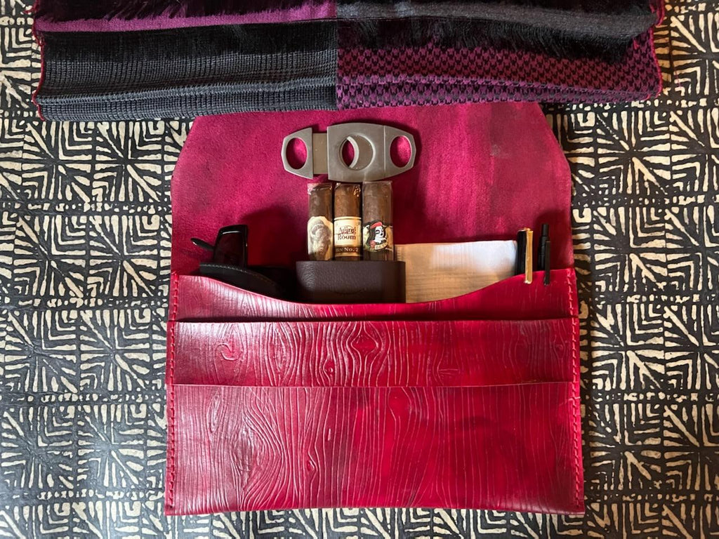 Élan No. 02: “Wine Élan No. 02 Noir leather envelope clutch, front view.”