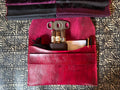 Élan No. 02: “Wine Élan No. 02 Noir leather envelope clutch, front view.”