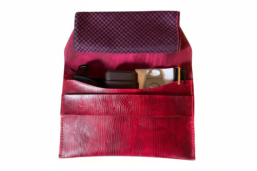 Élan No. 02: “Wine Élan No. 02 Noir leather envelope clutch, open front view.”